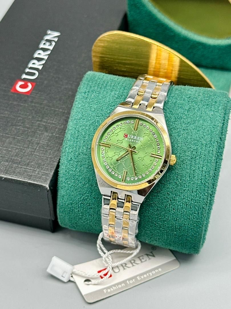 Montre femme verte et dorée